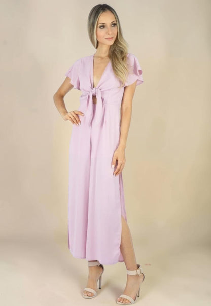 Macacão Liage Liso Pantacourt Manga Curta Decote Laço Fenda Lateral Transparencia Babado Chiffon Rosa Claro