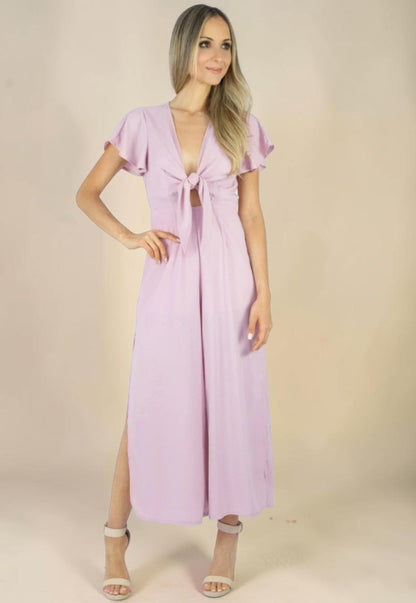 Macacão Liage Liso Pantacourt Manga Curta Decote Laço Fenda Lateral Transparencia Babado Chiffon Rosa Claro