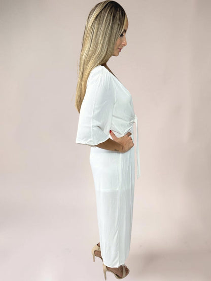 Macacão Liage Liso Manga Curta Transparencia Laço Decote V Branco Off White